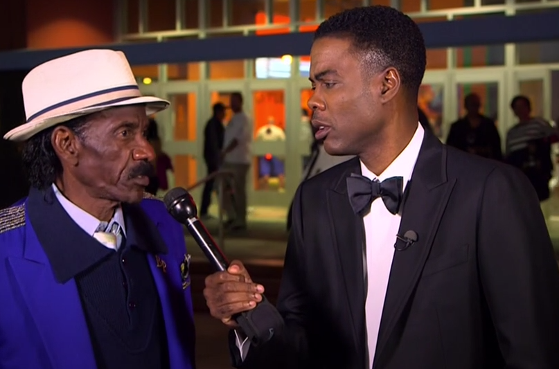 Chris Rock entrevistando sobre las películas nominadas