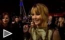 Los protagonistas de Los juegos del hambre en la premiere de la cinta