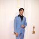 Taylor Zakhar Perez en la alfombra roja de los Oscar 2024