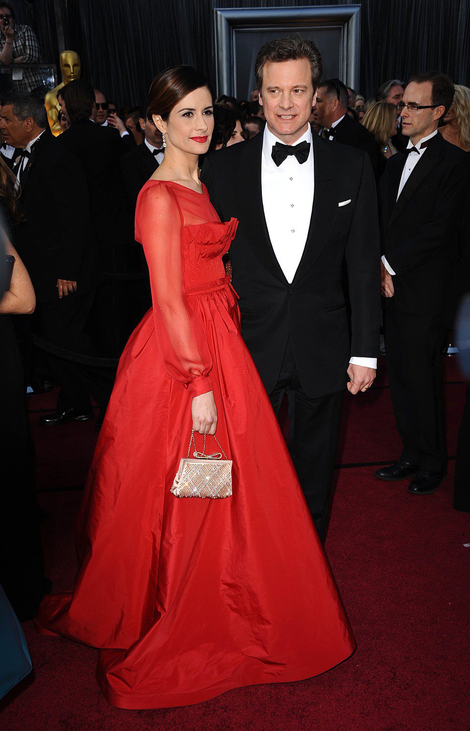 Colin Firth y Livia Giuggioli en la alfombra roja de los Oscar 2012
