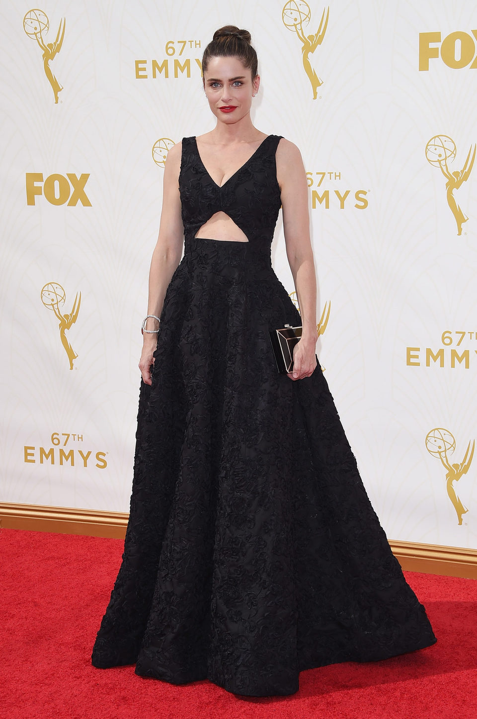 Amanda Peet en la alfombra roja de los premios Emmy 2015