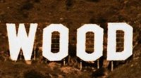 Unos activistas cambian el cartel de Hollywood por "HollyBoob" para concienciar sobre el cáncer de mama