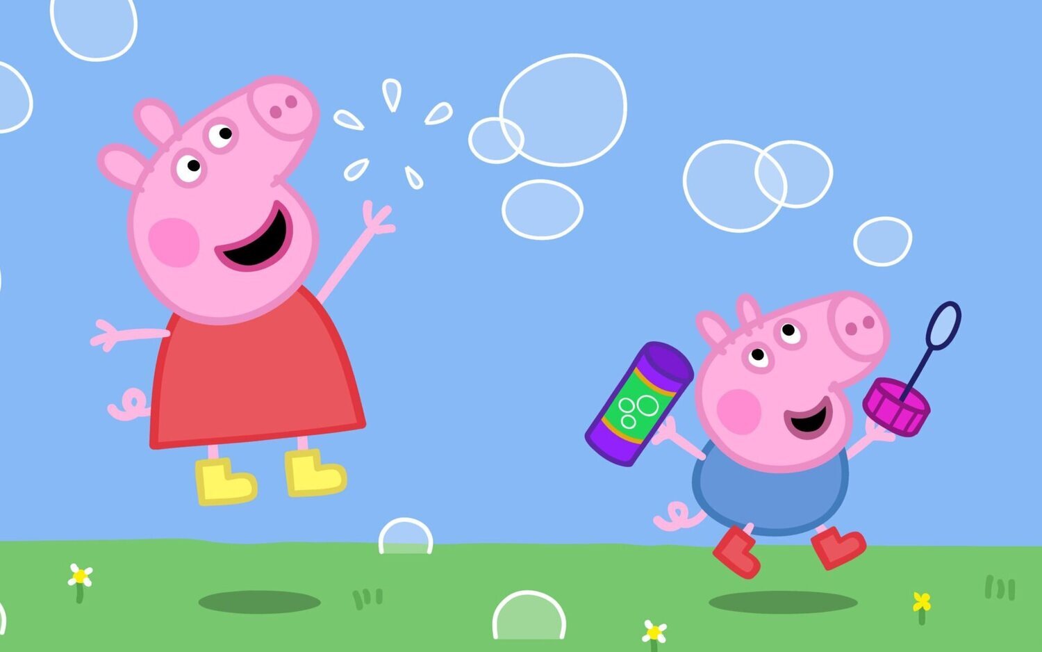 Peppa y George Pig jugando con burbujas de jabón