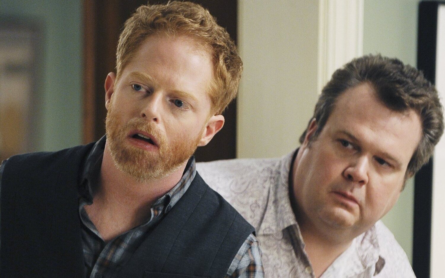 Jesse Tyler Ferguson y Eric Stonestreet como Mitch y Cam en 'Modern Family'