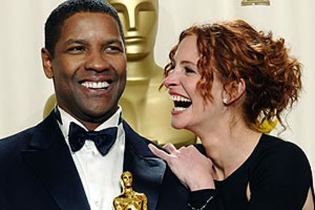 Julia Roberts se abalanza sobre Denzel Washington